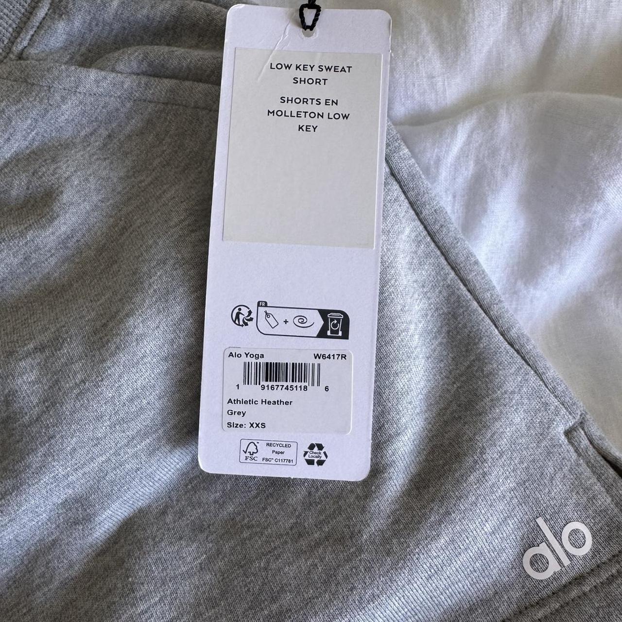 Alo Yoga heather grey Low Key Sweat Shorts in size | Depop