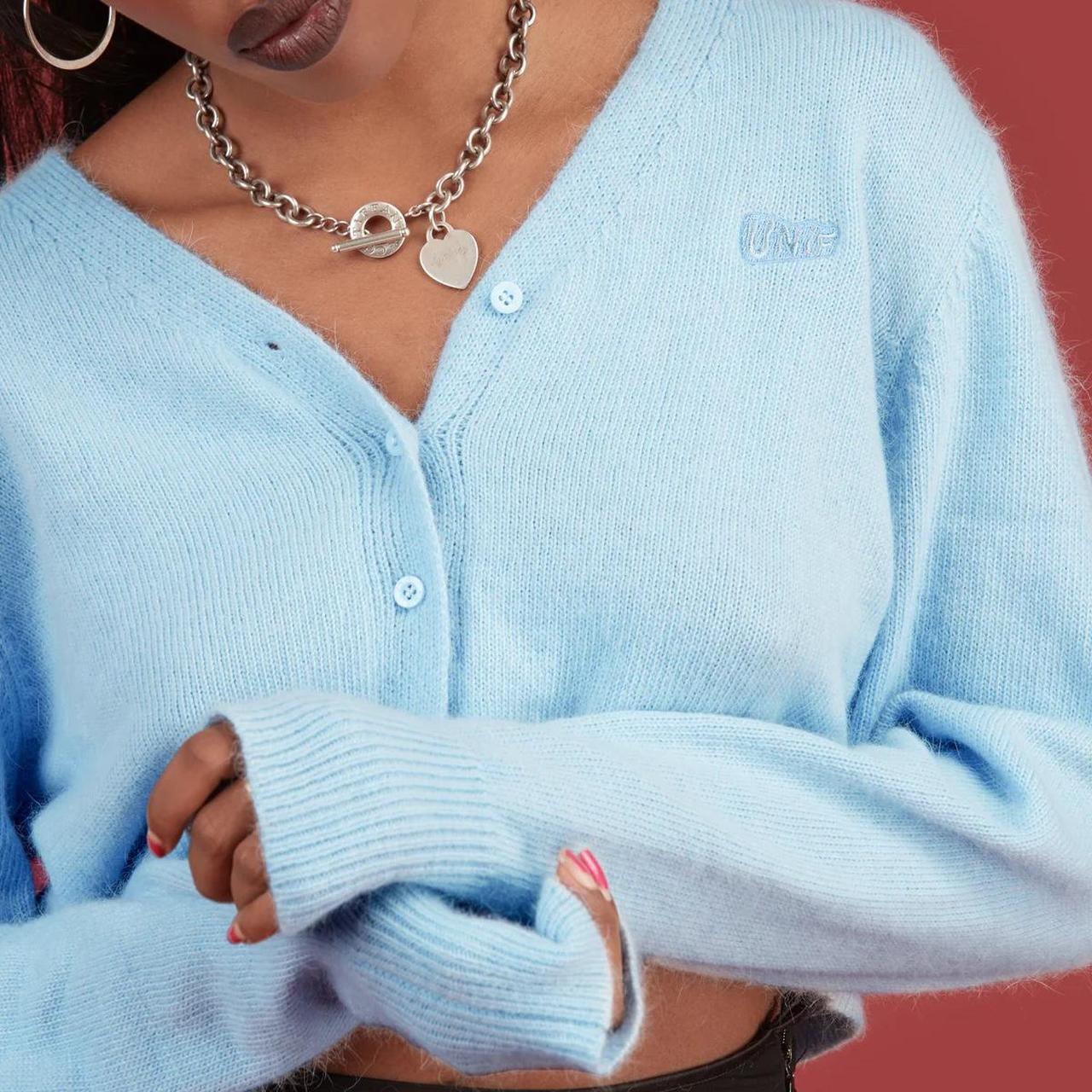 unif liv cardigan sweater in baby blue. size large. Depop