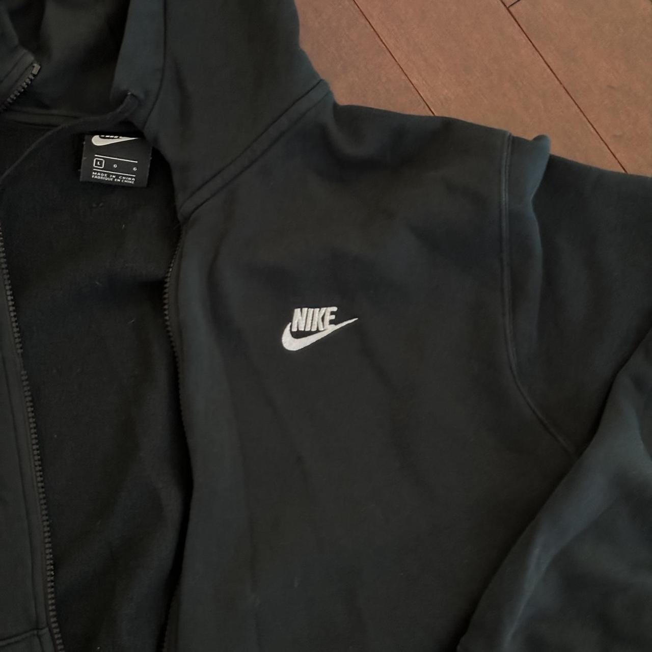 Black Nike zip up jacket in a men’s large Model... Depop
