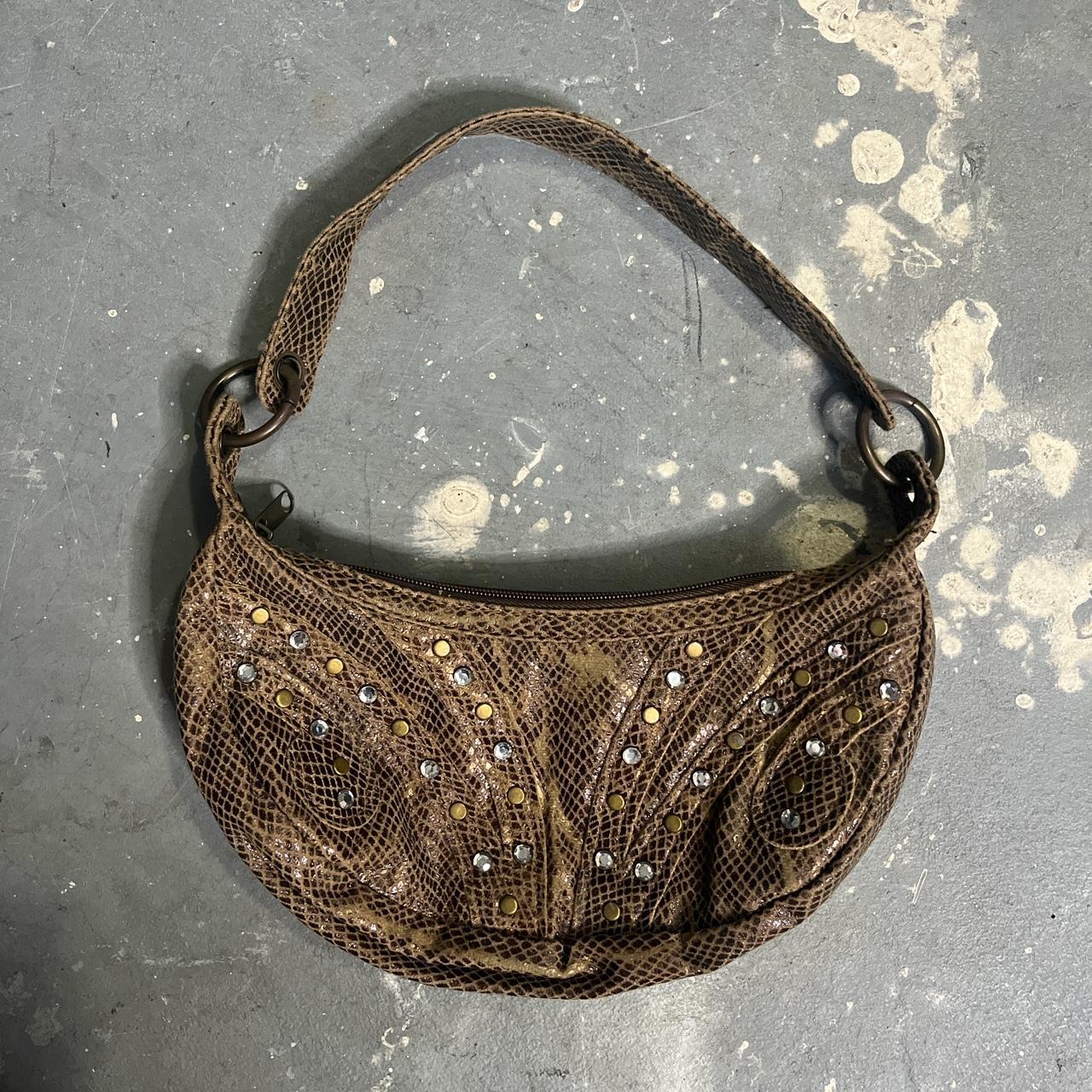 Multi snake outlet purse