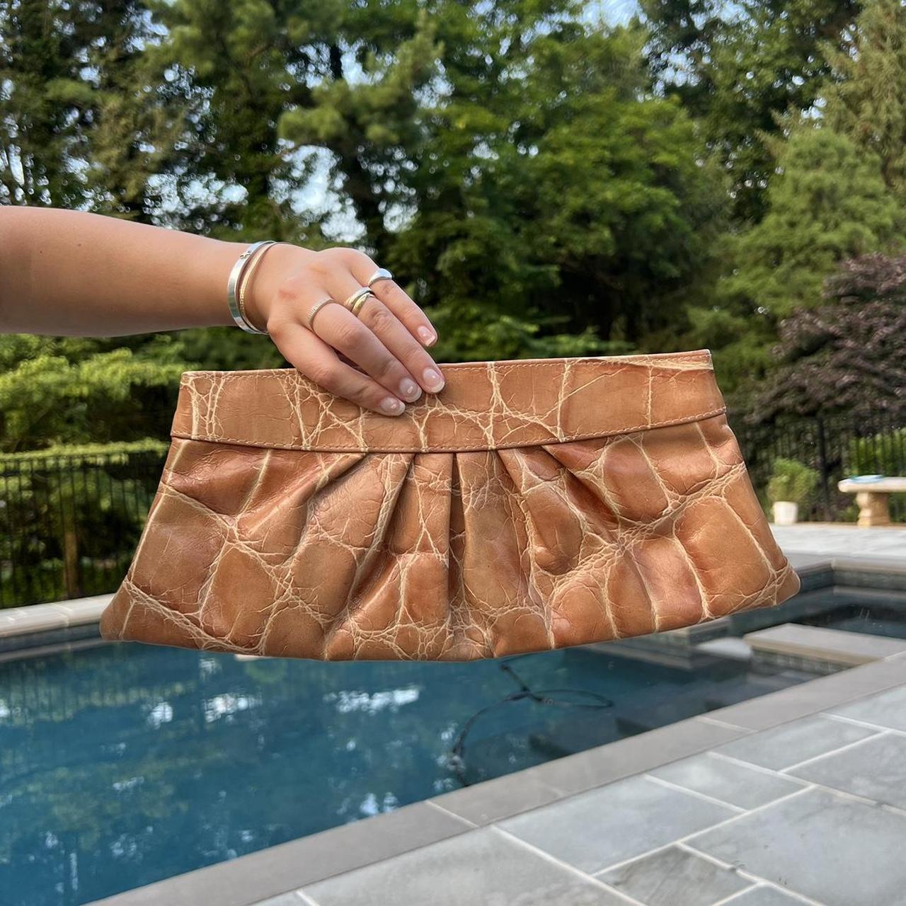 Lauren Merkin offers Leather clutch