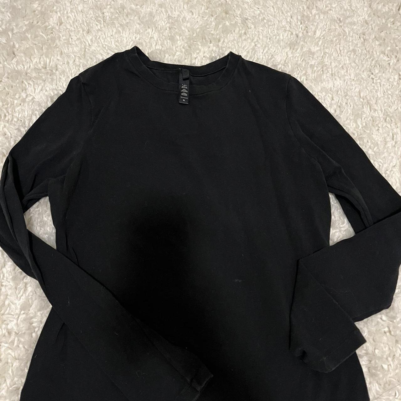 Skims Women's Black T-shirt | Depop