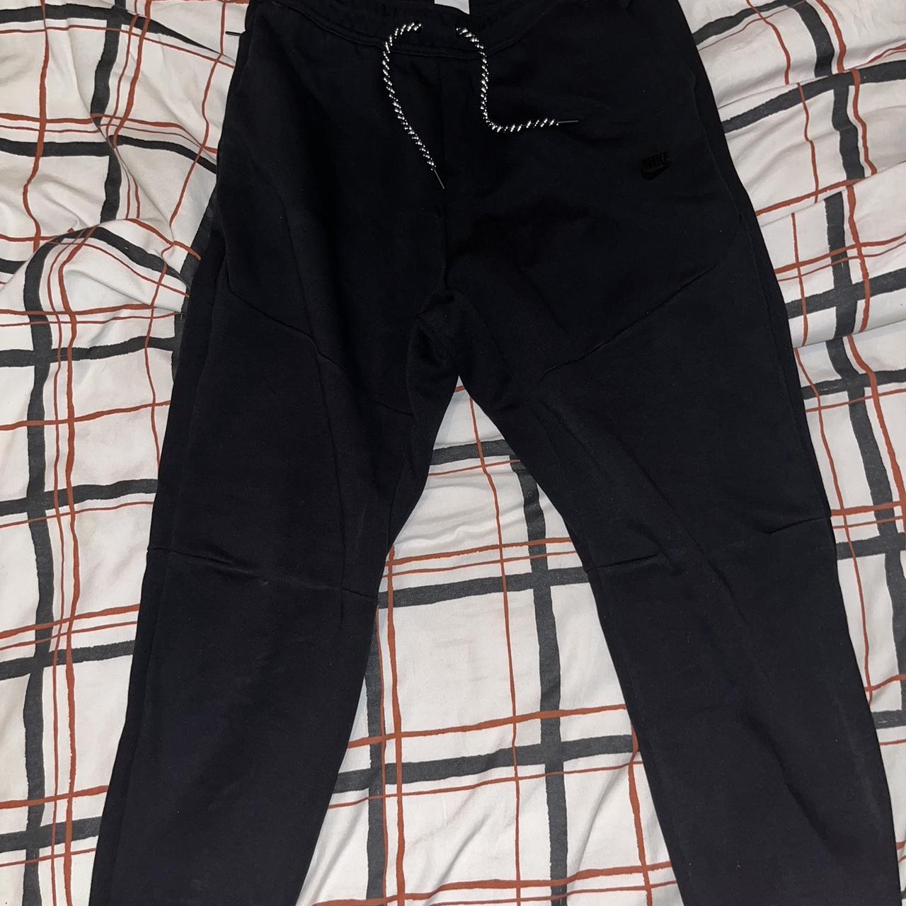 Black Nike tech fleece joggers worn once size L... - Depop