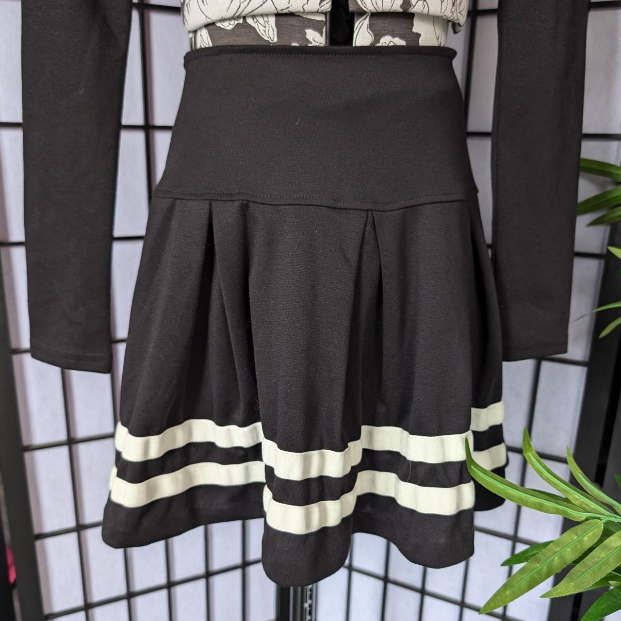 Black and white xs top and skirt cheerleader set. Depop