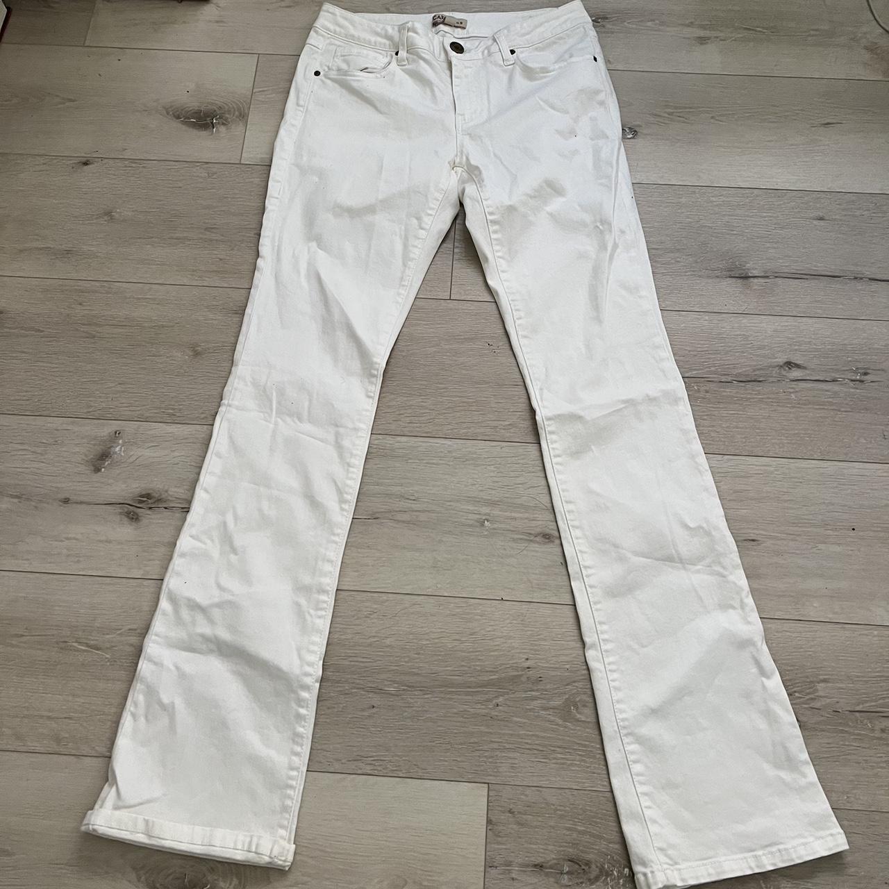 The cutest white low rise, boot cut jeans!! Too big... - Depop