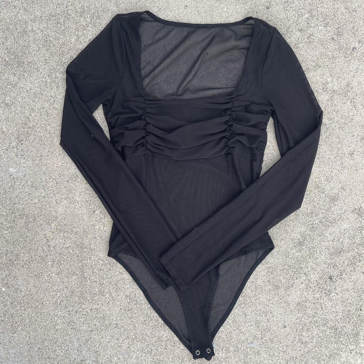black sheer one piece/body suit with button... - Depop