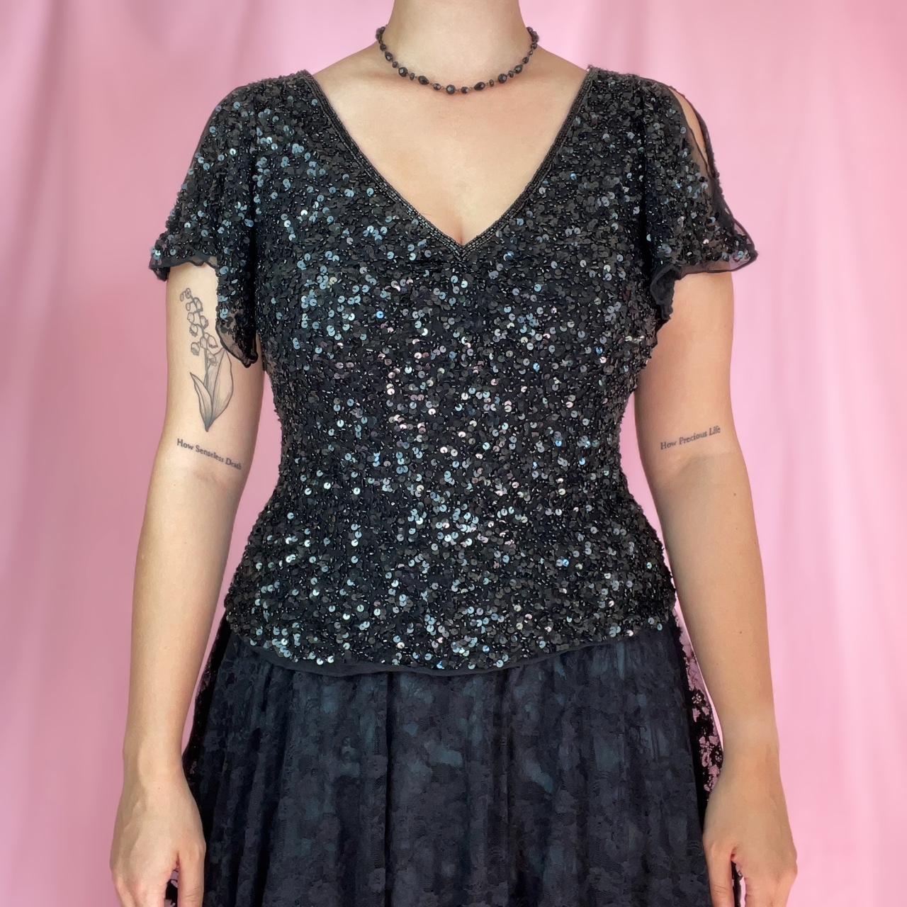 Stunning black beaded top covered in sequins