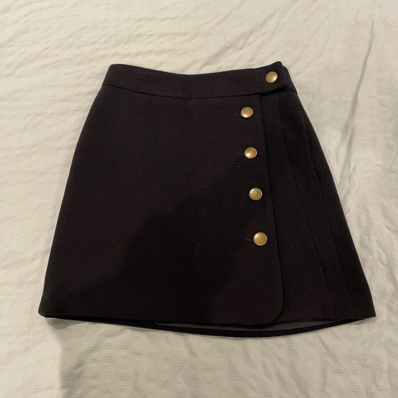 M&S black mini skirt. Size 8. The fabric is a felt... Depop