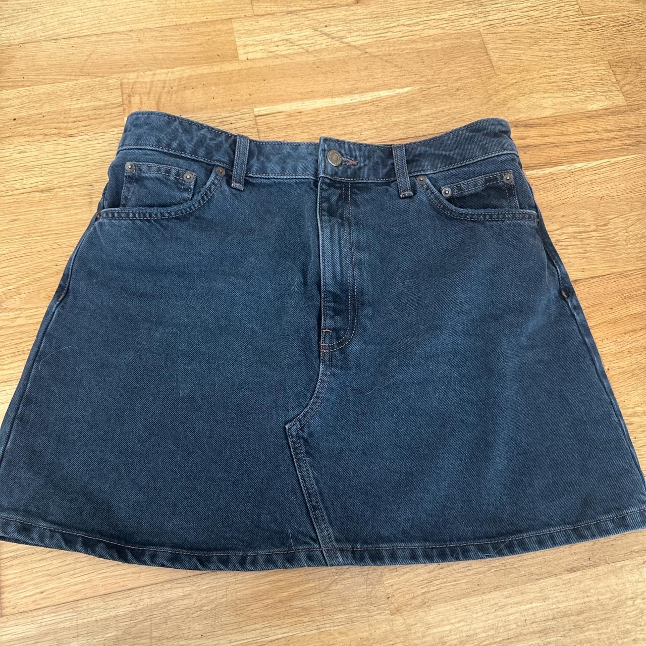 black mini denim skirt, size 12. Worn once... Depop