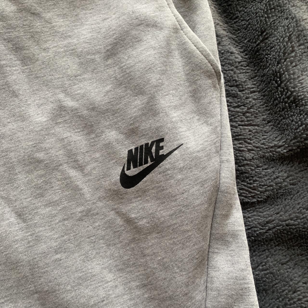 nike tech grey bottoms