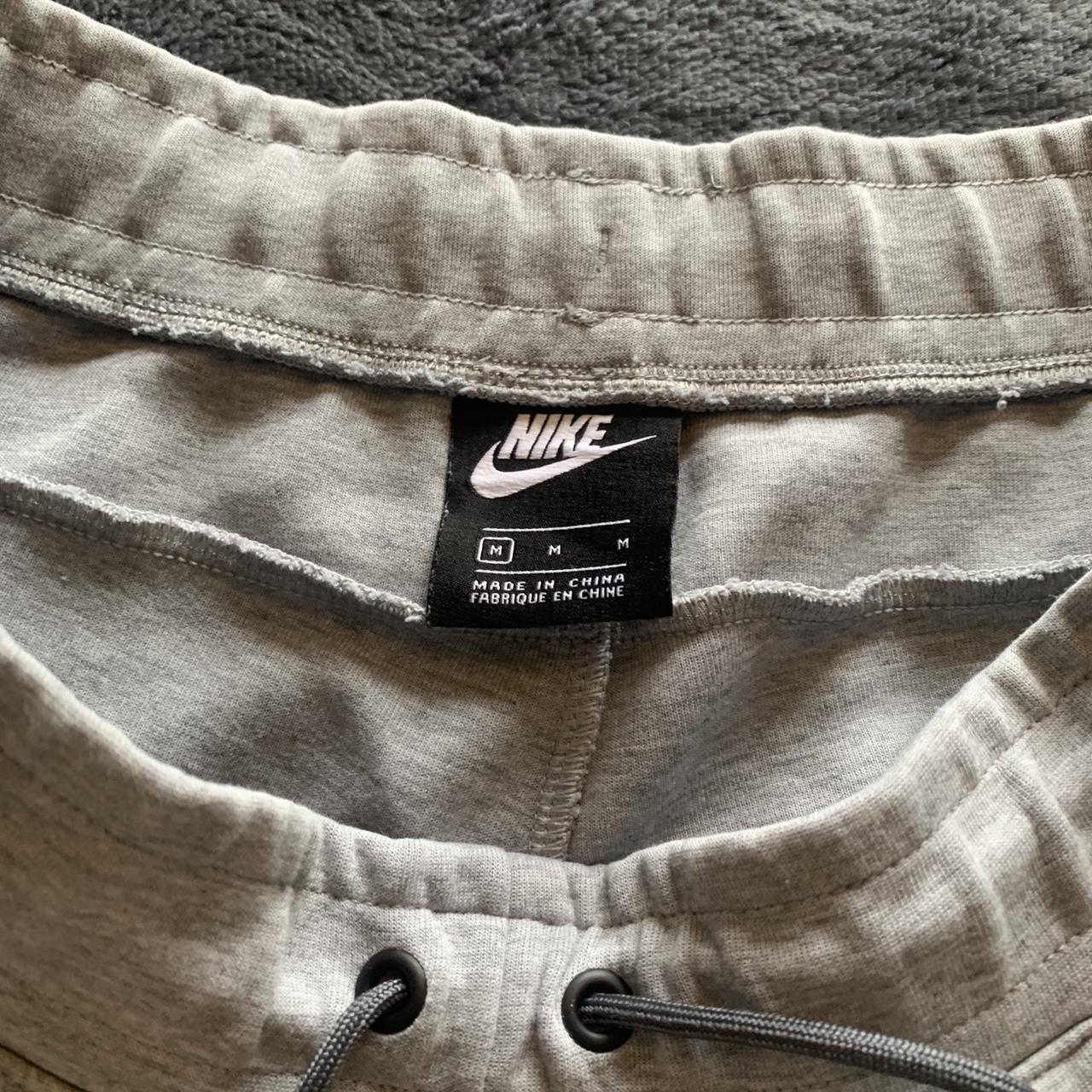 nike tech grey bottoms