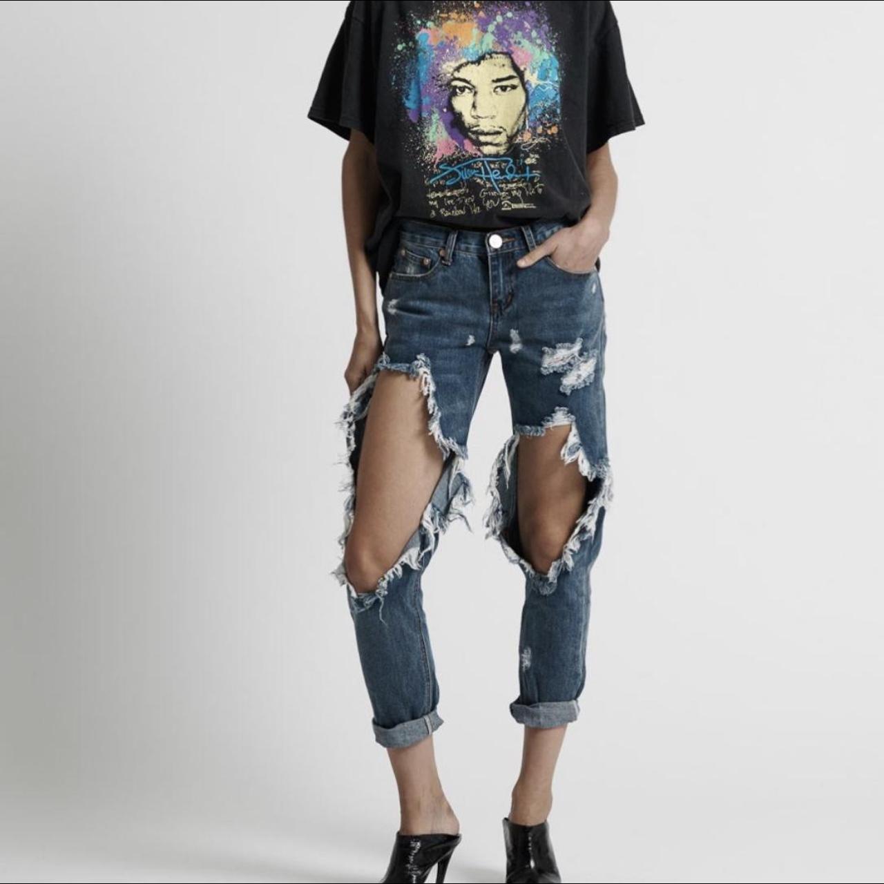 One leg ripped jeans best sale