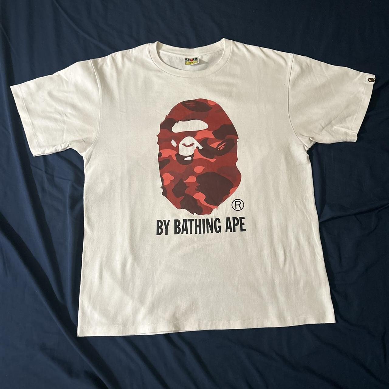 Here we have a: Bape Red Camo Head Tee Condition:... - Depop