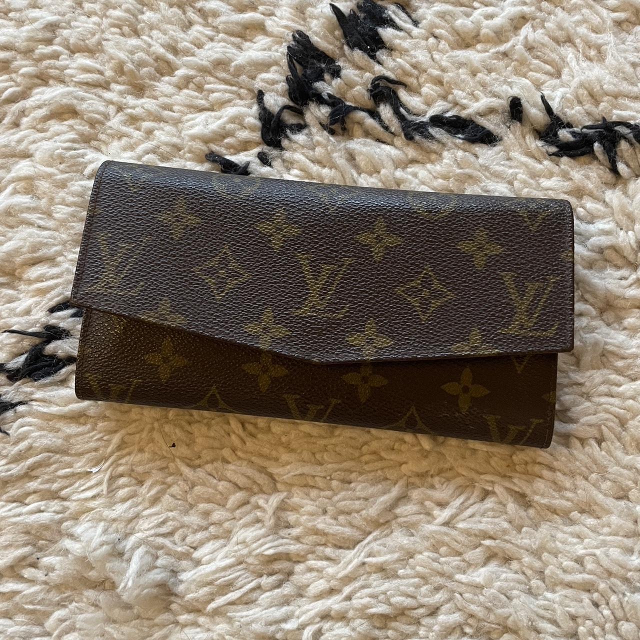 Authentic Louis Vuitton men's wallet. Used and in - Depop