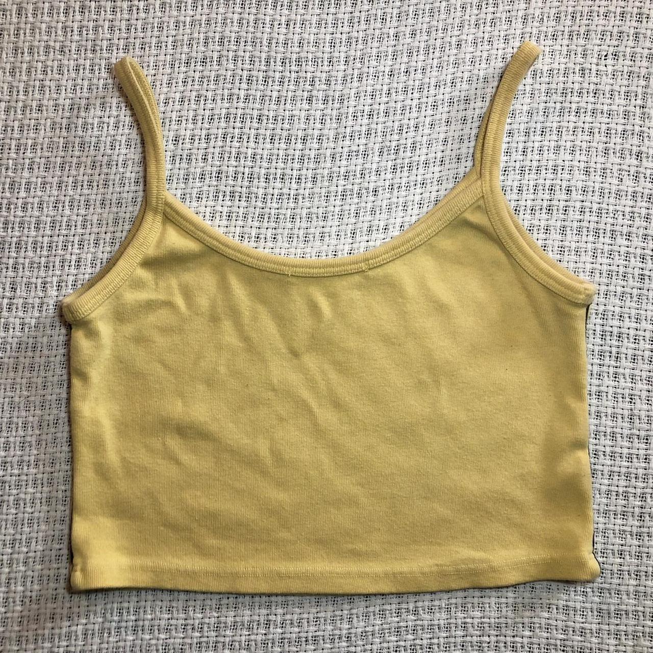 brandy melville yellow crop tank top 💛 reads “los... Depop