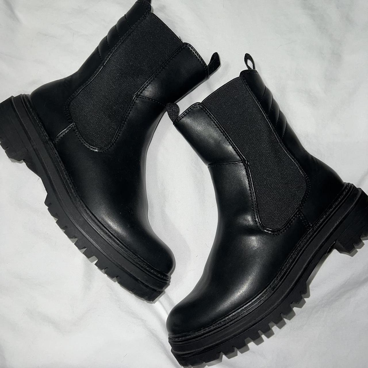 A new store day black boots