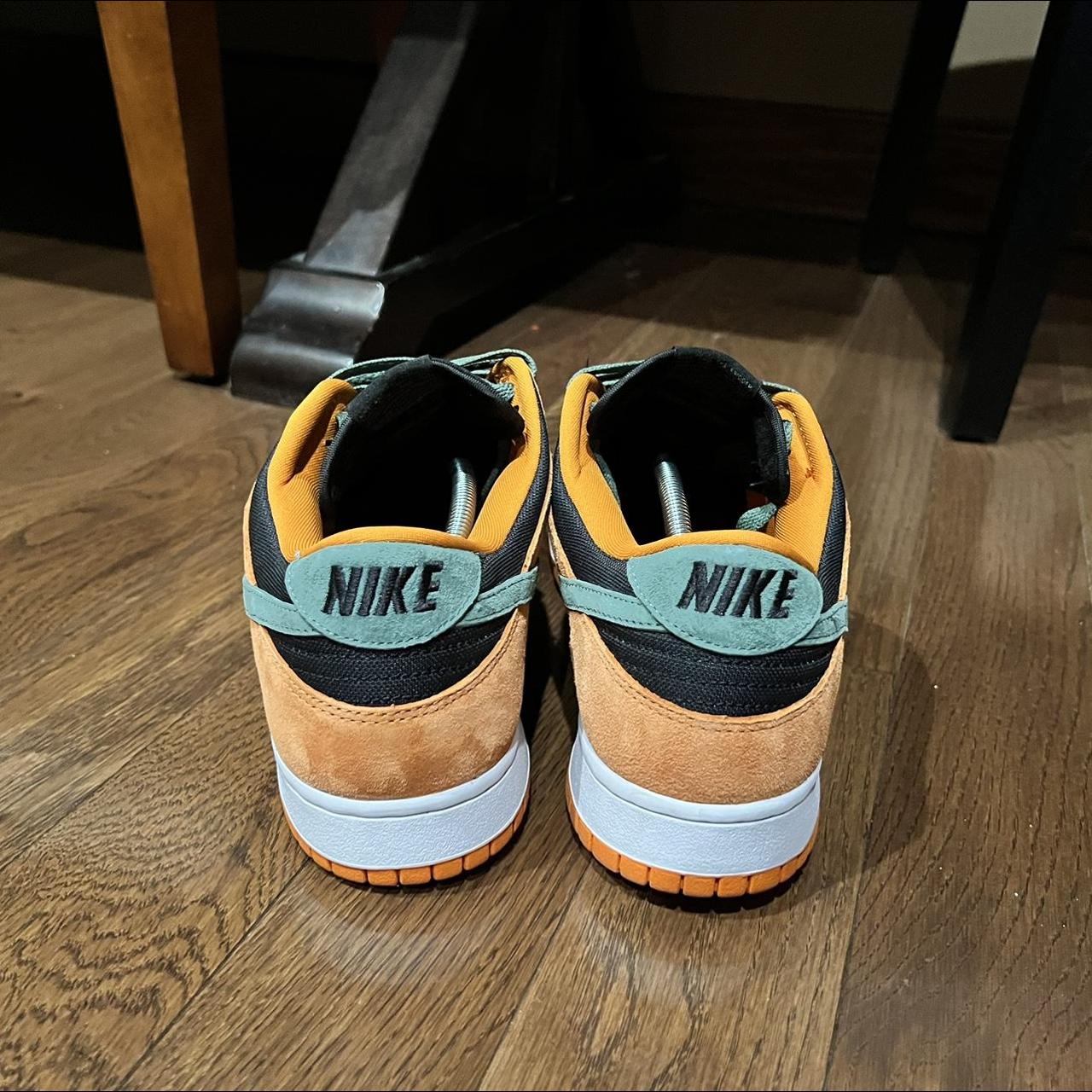 black and gold team jordans