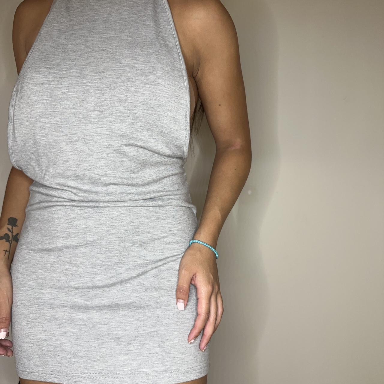 Sexy Finesse jersey dress. Open back that ties... - Depop