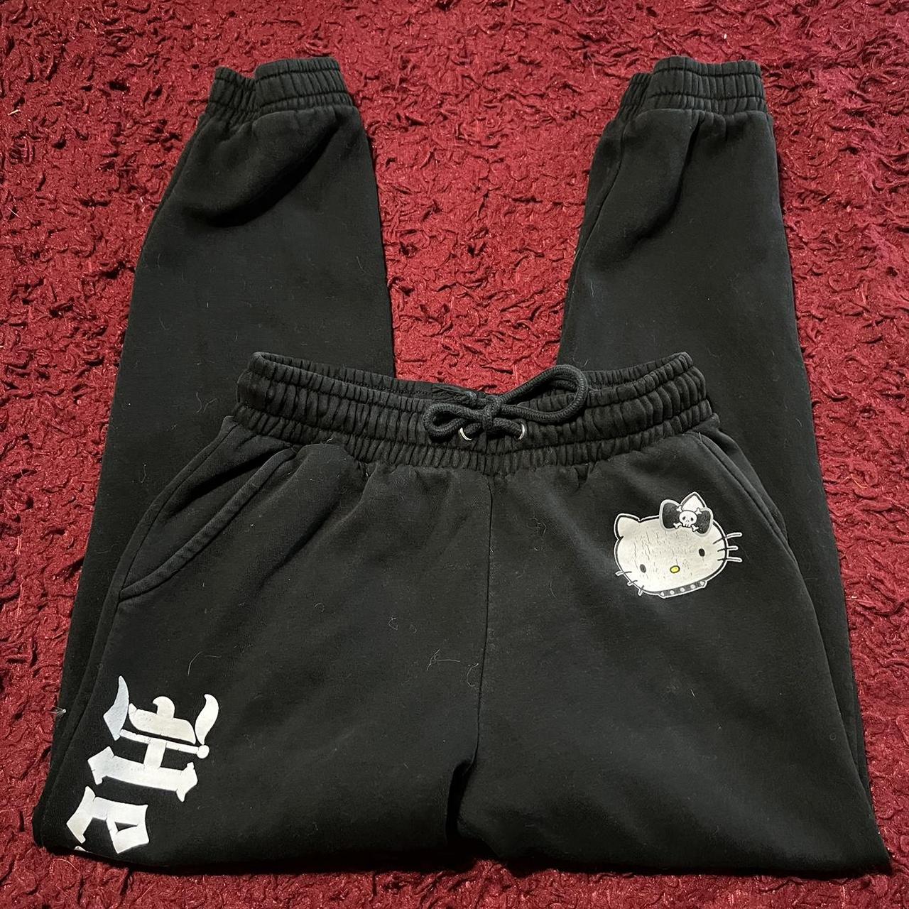 Very loved black emo hello kitty jogger sweat pants... - Depop