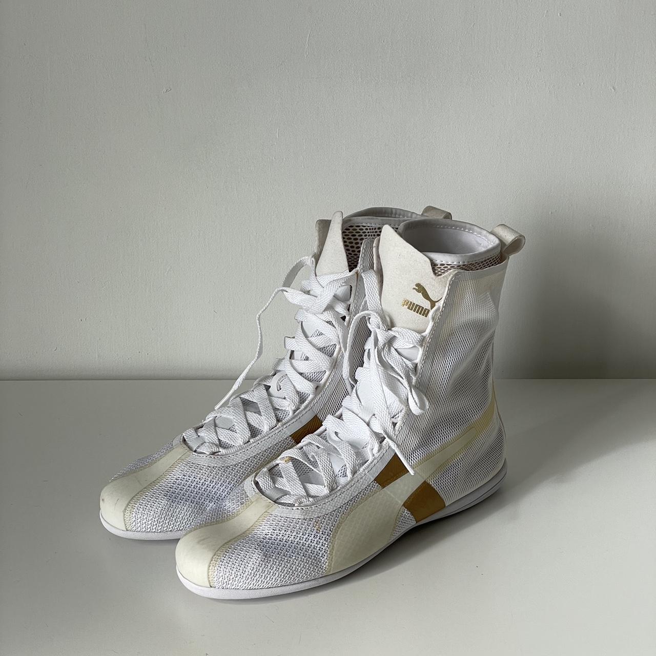 Gold fashion and white high pumas