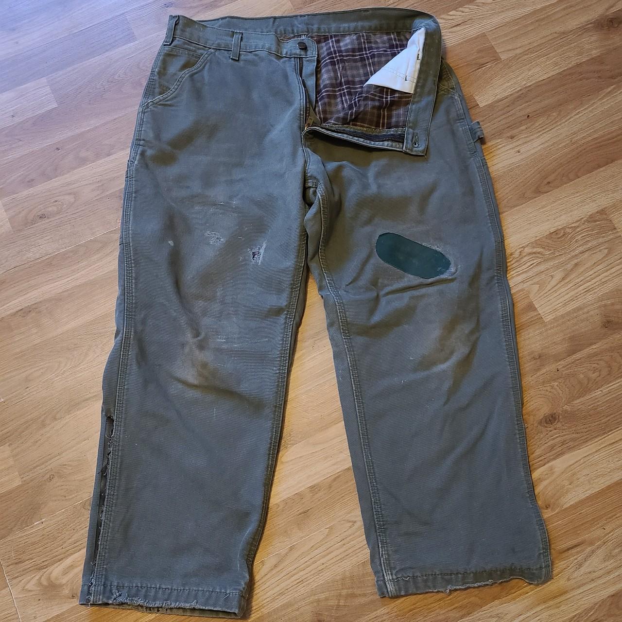 Gray green distressed carharrt pants. Size 36x38.... - Depop