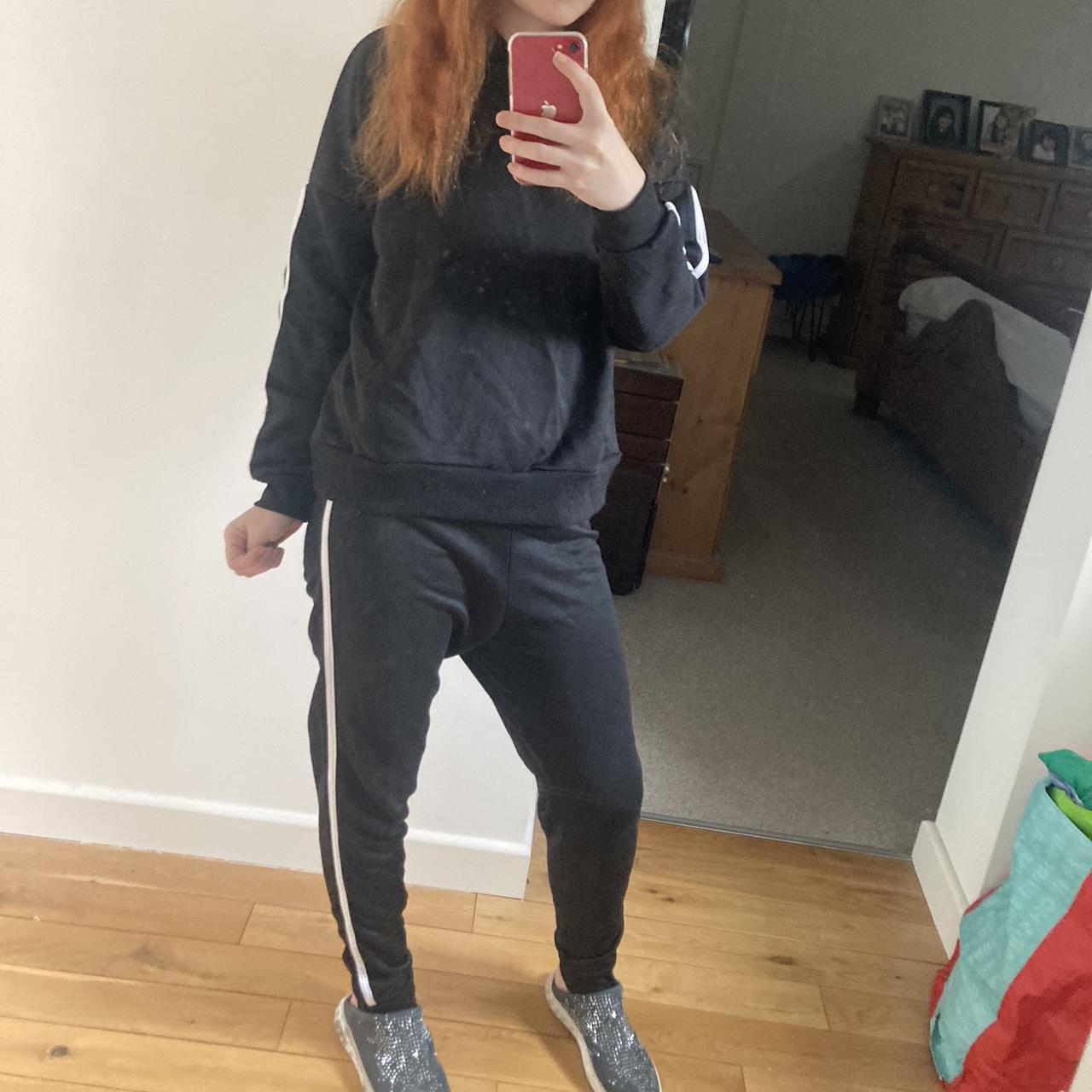 Black tracksuit coord with a white stripe from... Depop