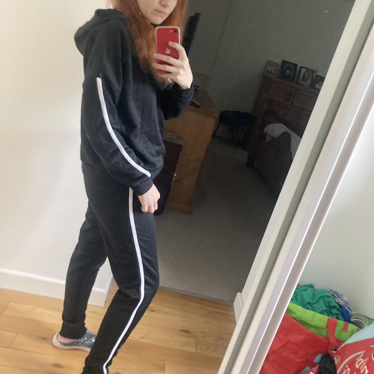 Black tracksuit coord with a white stripe from... Depop
