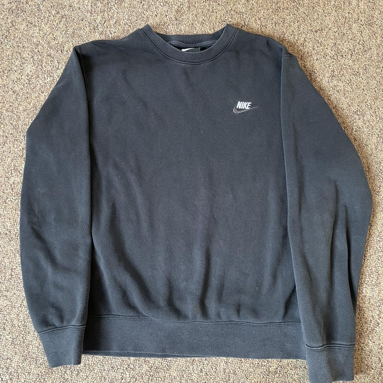 Black Nike sweatshirt with black swoosh in hood... - Depop