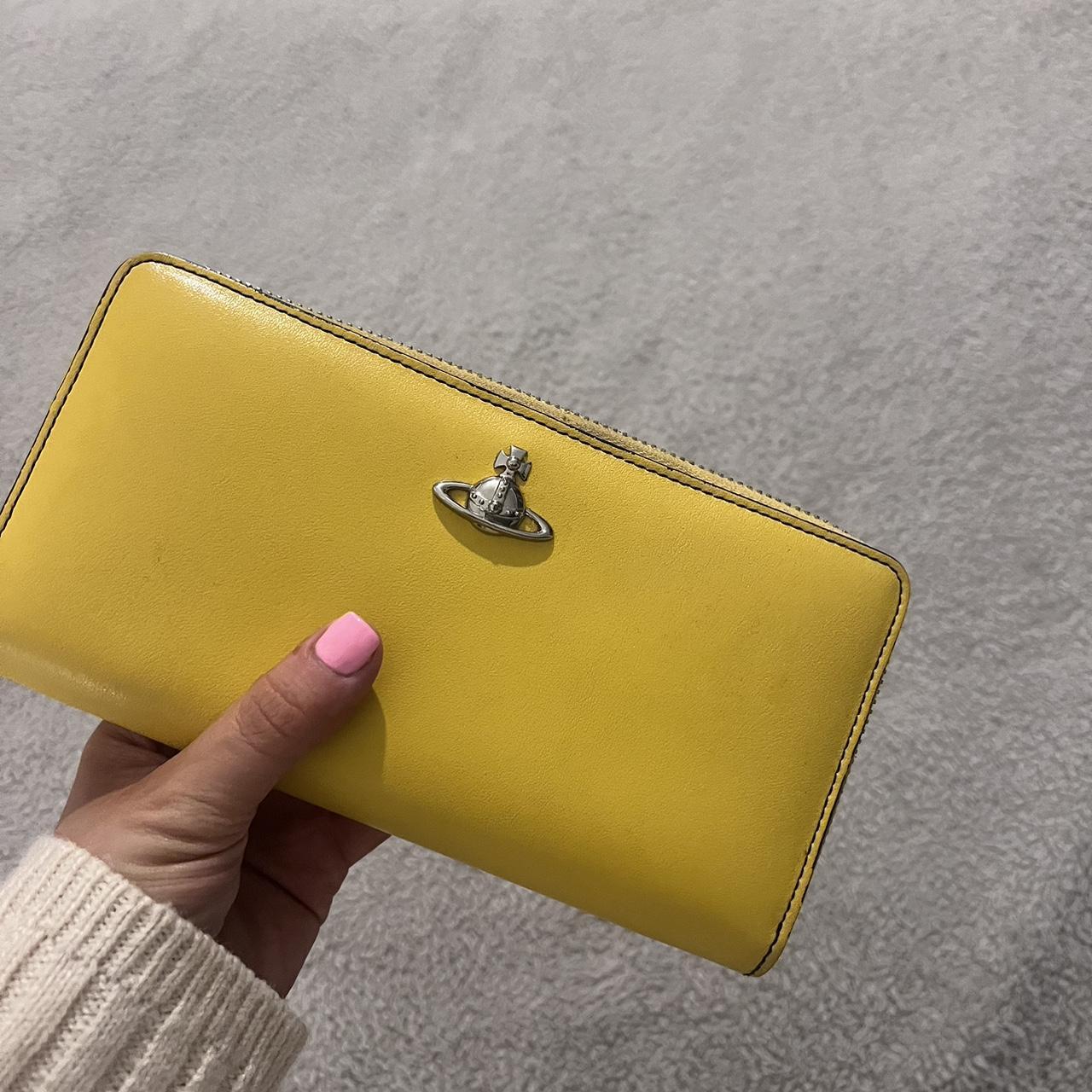 Yellow vivienne westwood purse sale