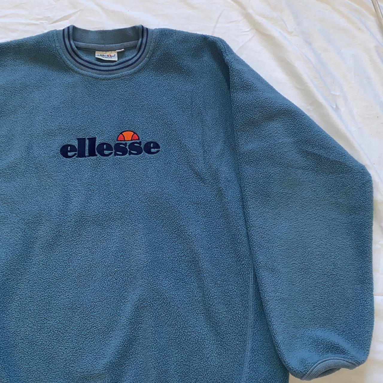 Blue ellesse fleece jumper. Lovely colour with logo... - Depop