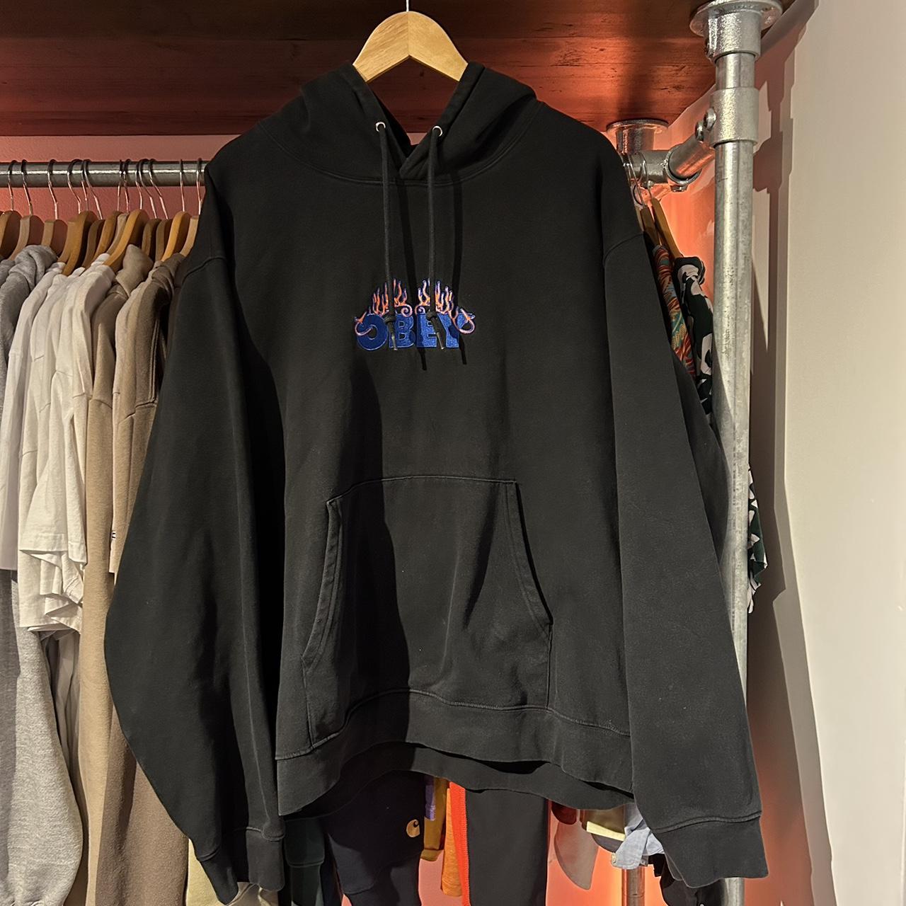 Men’s black obey hoodie with embroidered design.... Depop