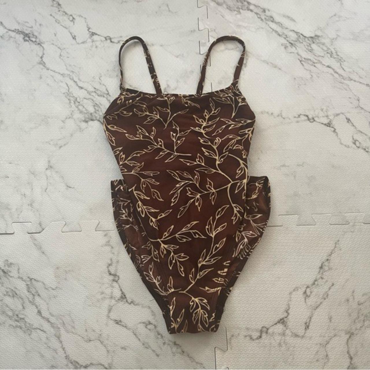 Vintage La Blanca lace up back high leg one piece... Depop