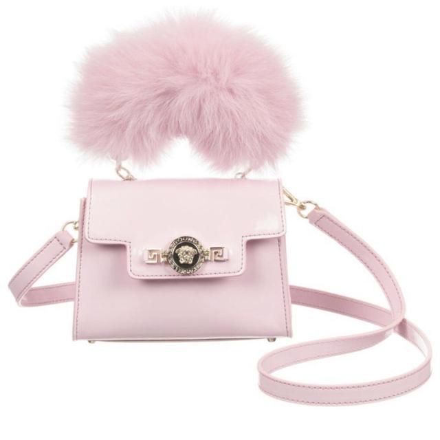 Never used Young Versace pink fur hand bag mini. Depop