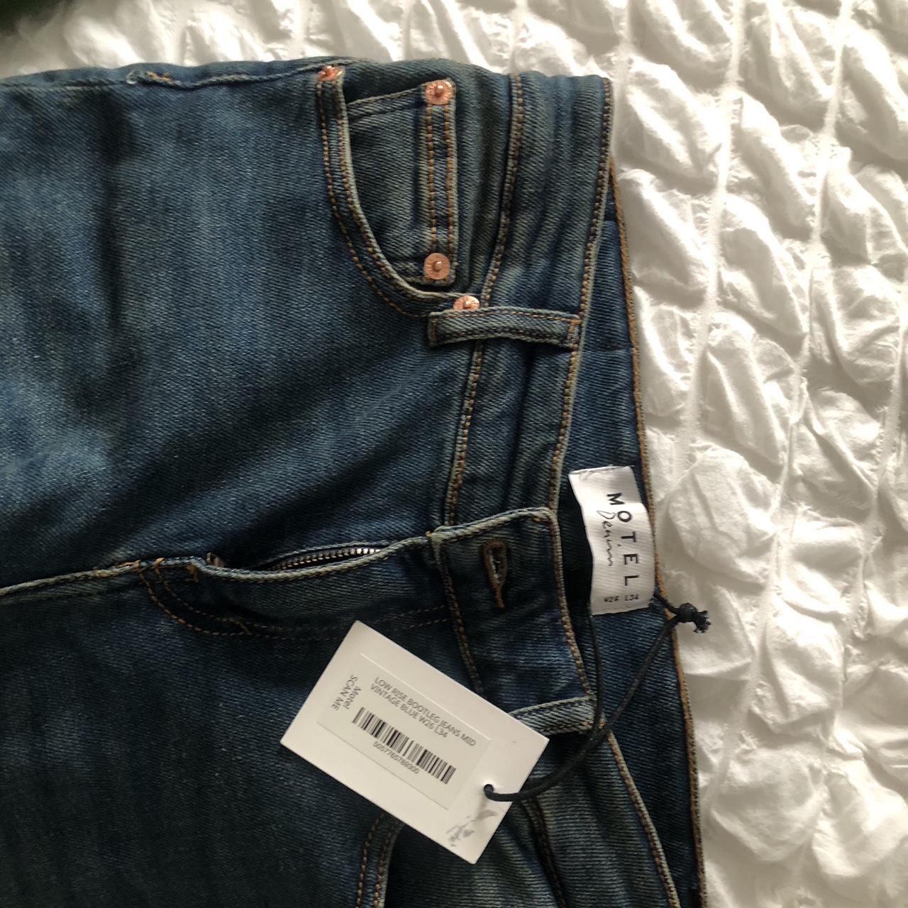 Motel Rocks Low Rise Bootleg (Flare) Jeans in Mid... Depop