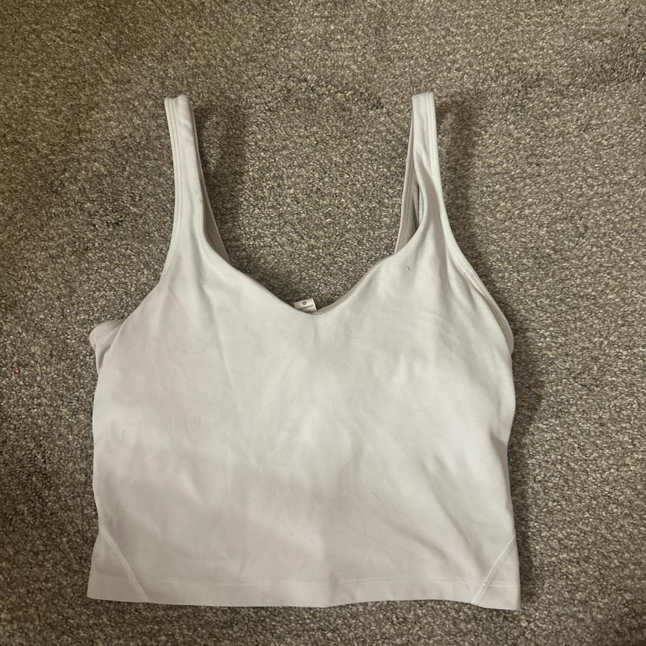 White Lululemon cropped align tank. Somewhat faded... - Depop