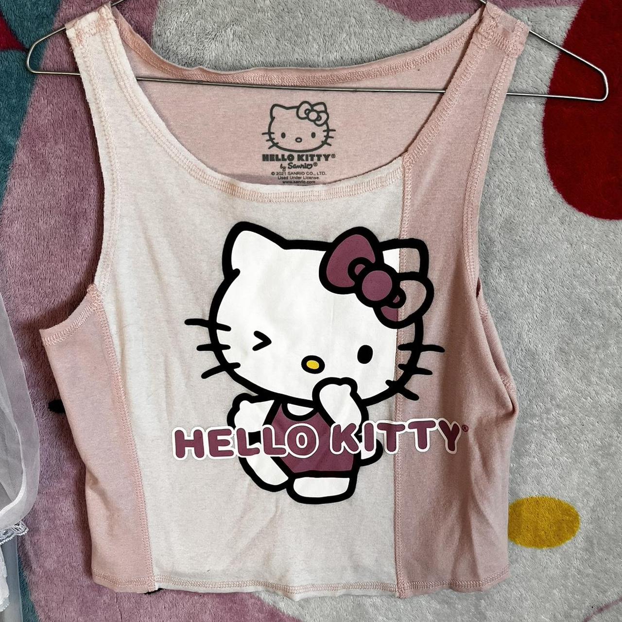 Pastel pink hello kitty top, worn a few times, not... Depop