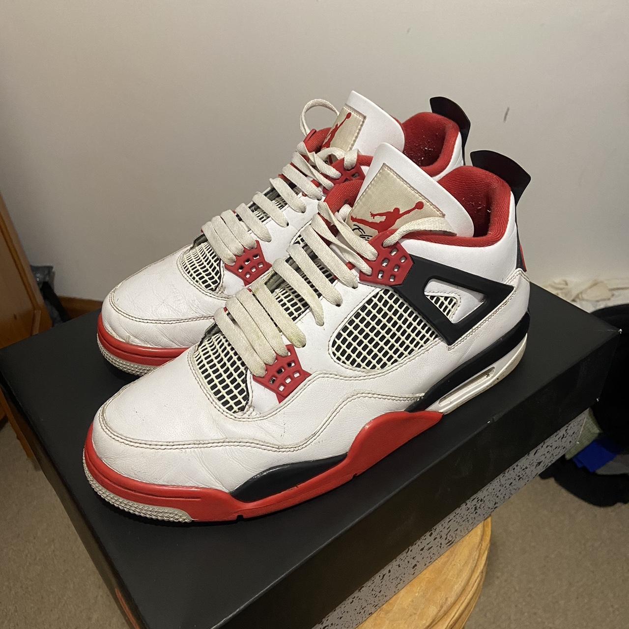 Fire red Jordan 4’s. Good condition a few minor scuffs. - Depop