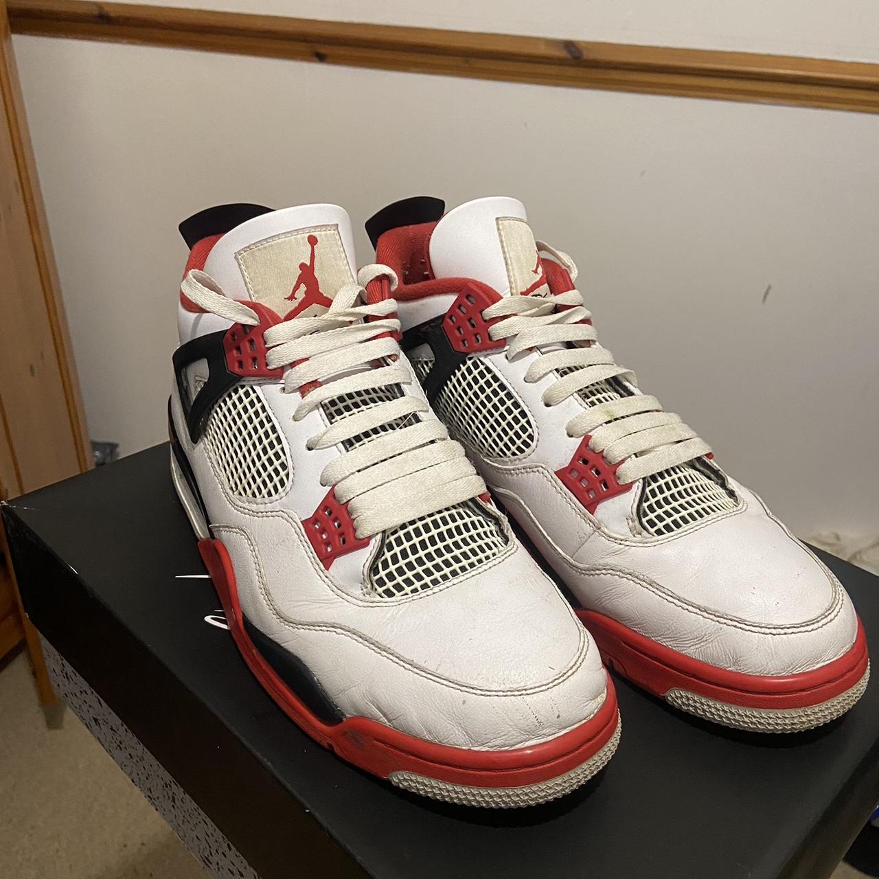 Fire red Jordan 4’s. Good condition a few minor scuffs. - Depop