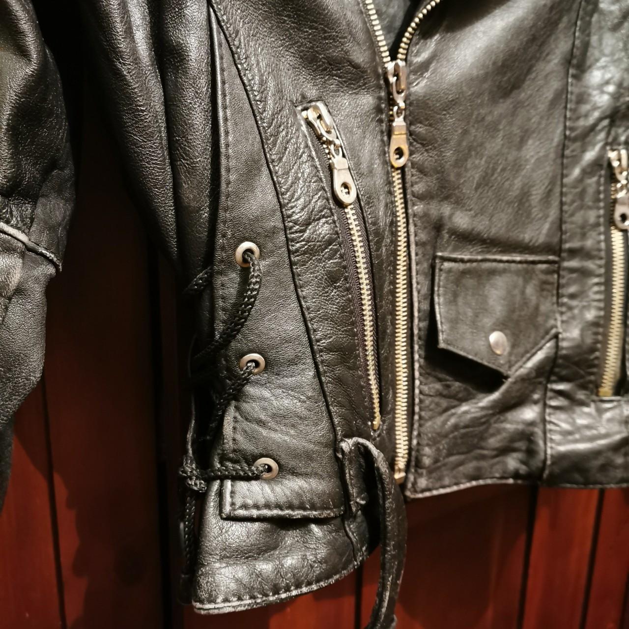 Vintage black leather biker jacket. Says xl in tag... - Depop