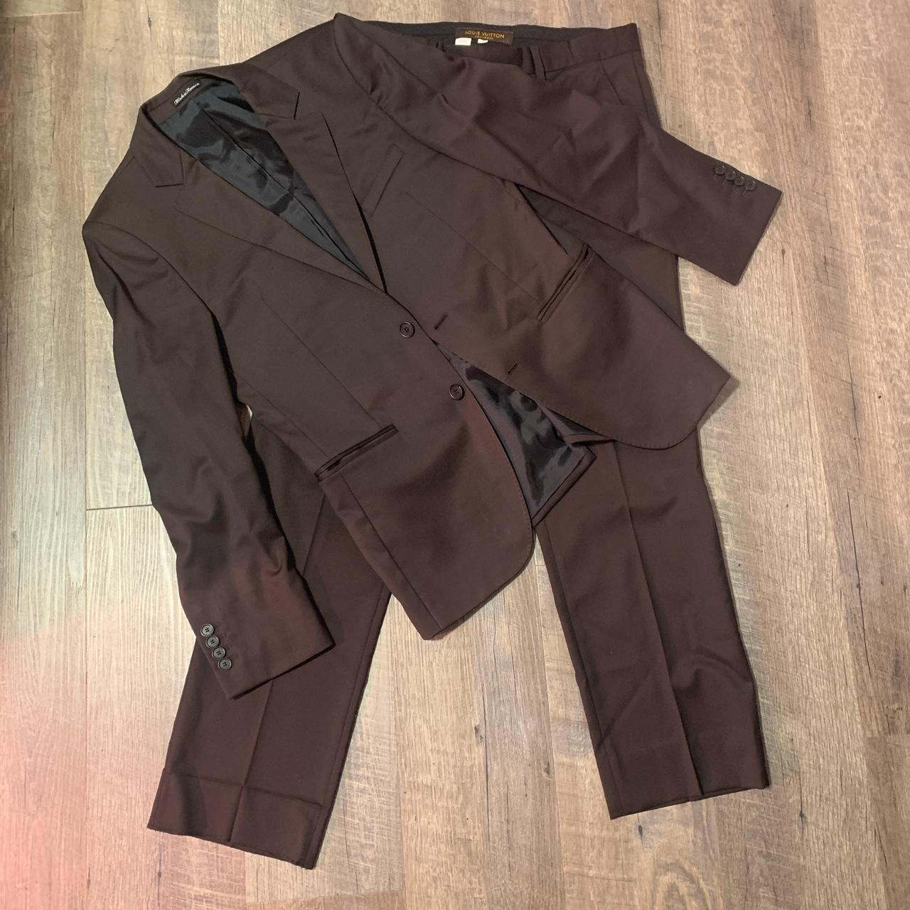 Brown Louis Vuitton suit, worn once. Brand new.
