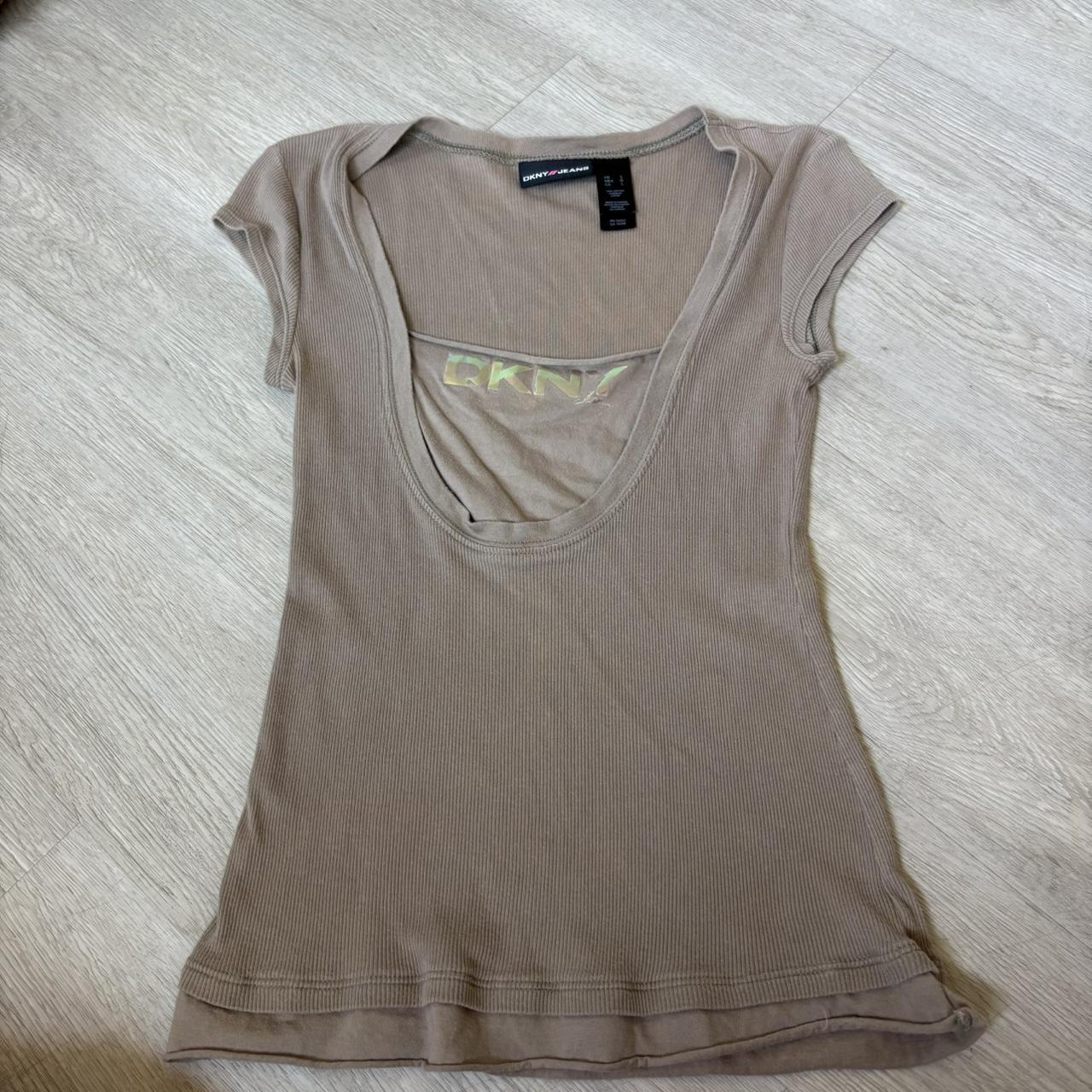 y2k dkny tee. tagged a large but models a small | Depop