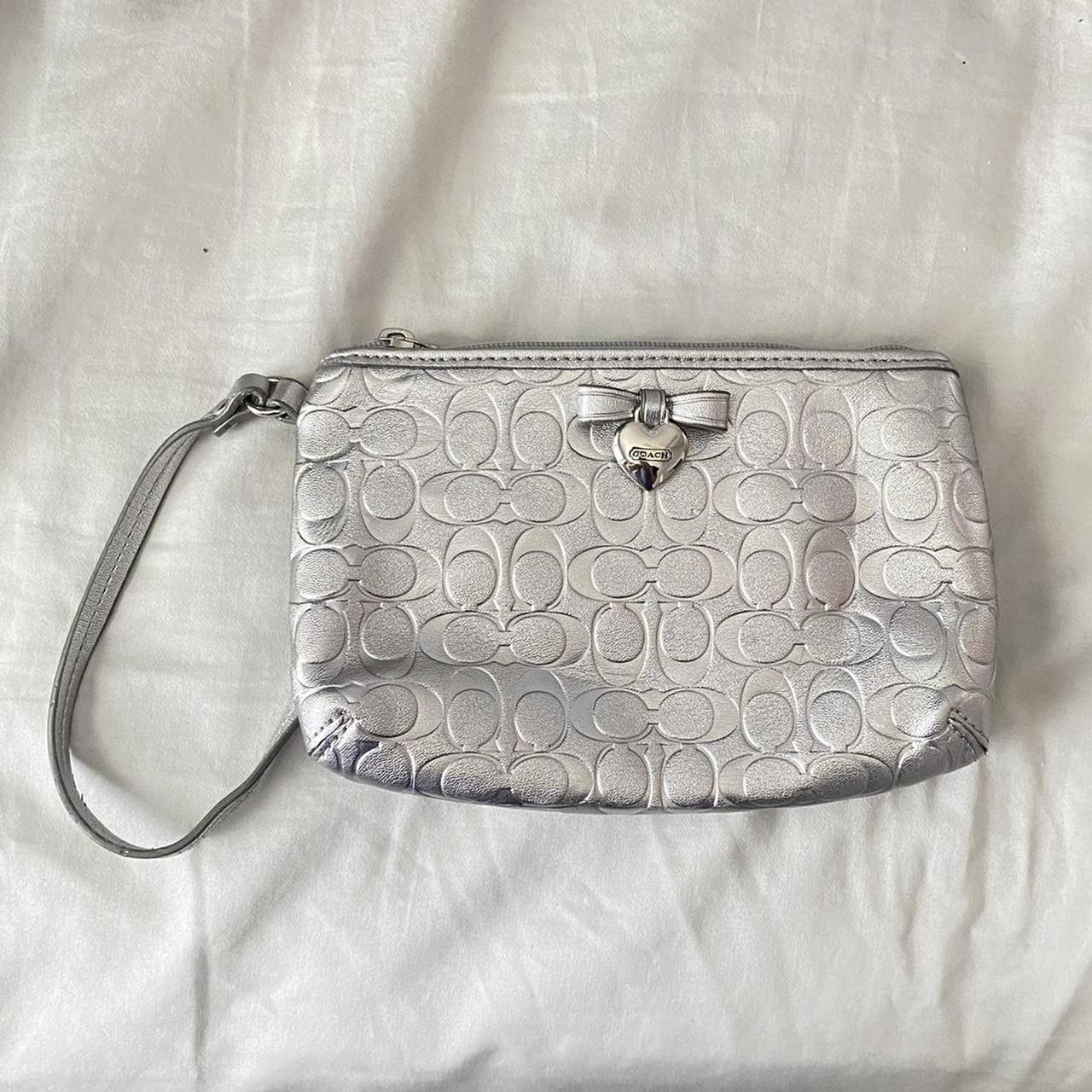 coach silver wristlet with heart pendant • never... Depop
