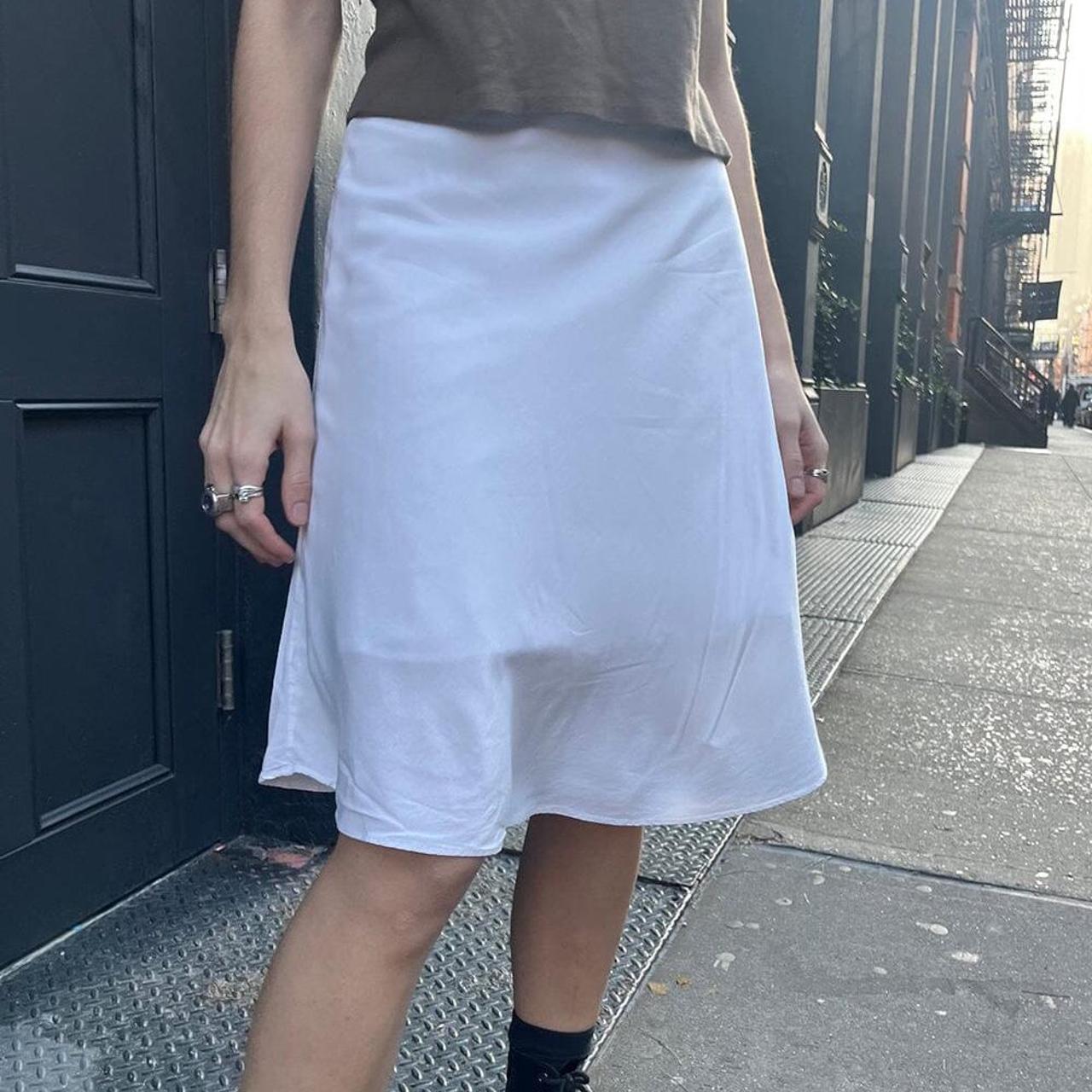 Brandy Melville Charlotte white cotton midi skirt.... Depop