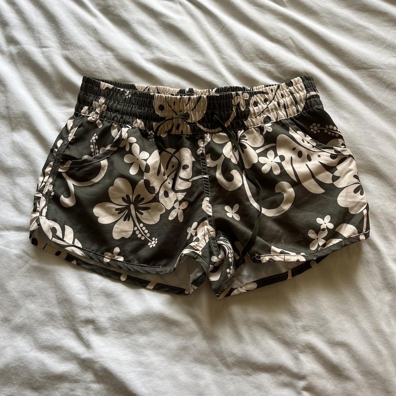 Coconut girl board shorts. Says xl but would fit... Depop