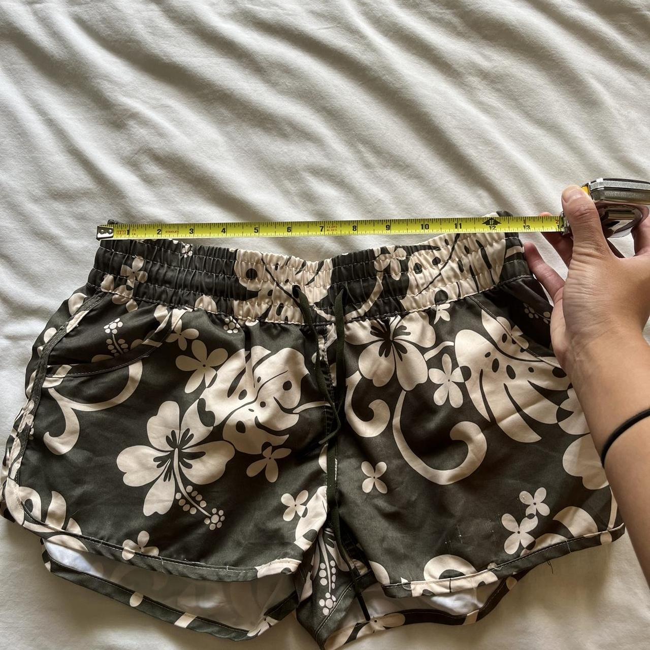 Coconut girl board shorts. Says xl but would fit... Depop