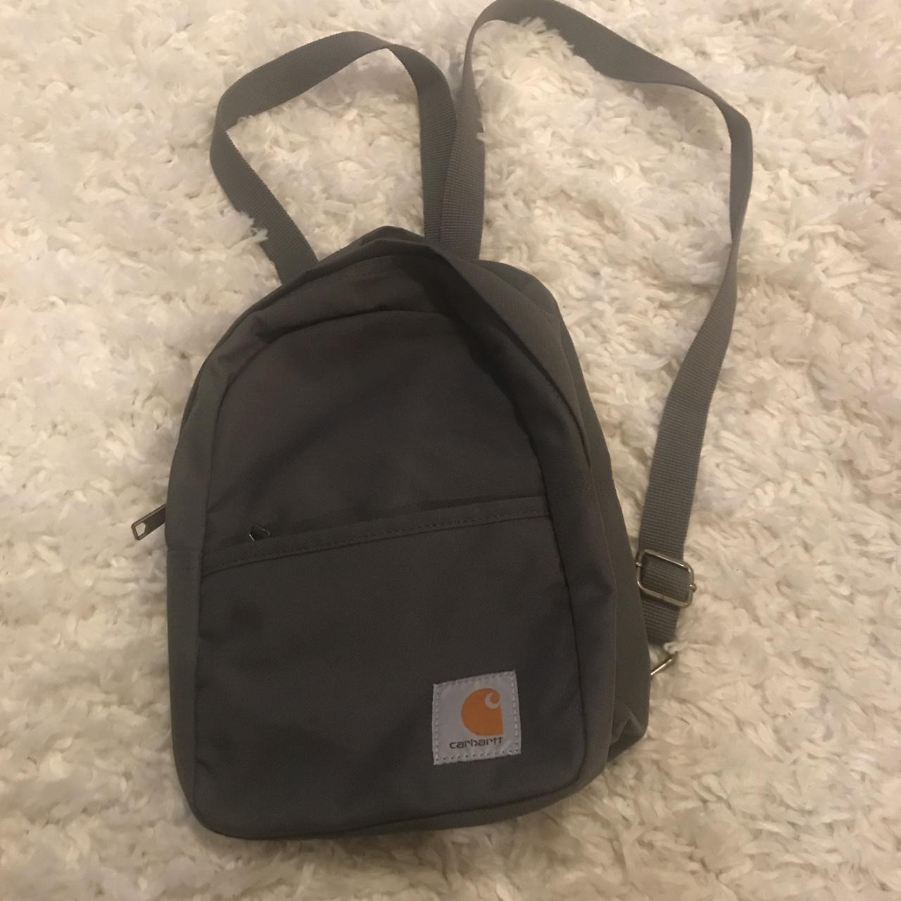 Small gray Carhartt mini backpack. A sporty and... Depop