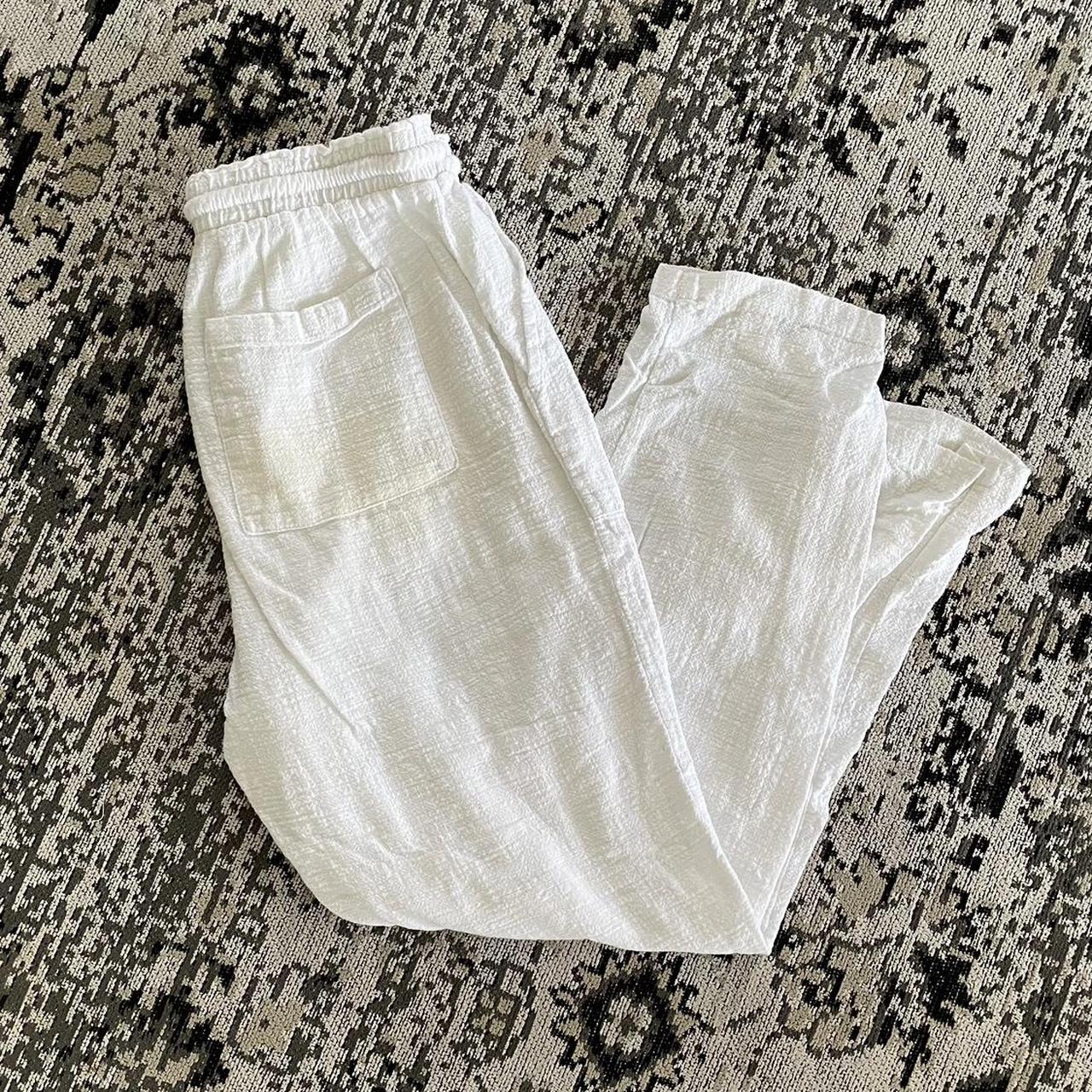 White resort style pants. Size 8 would fit size... Depop