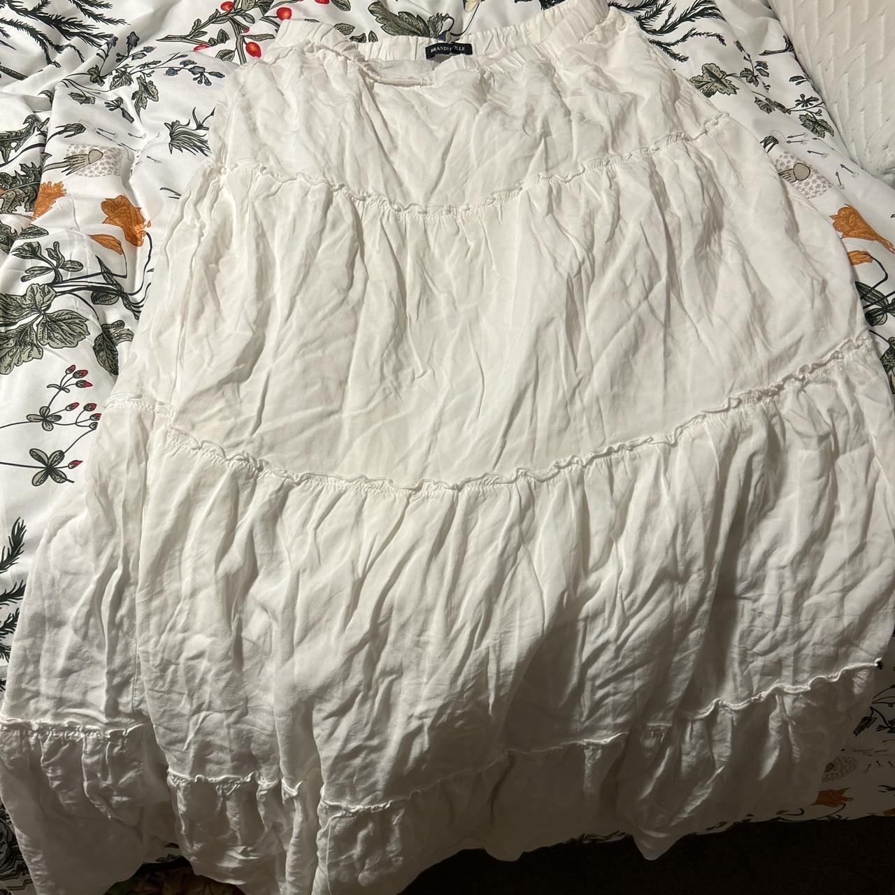 brandy melville white izzy skirt never worn with tags! Depop