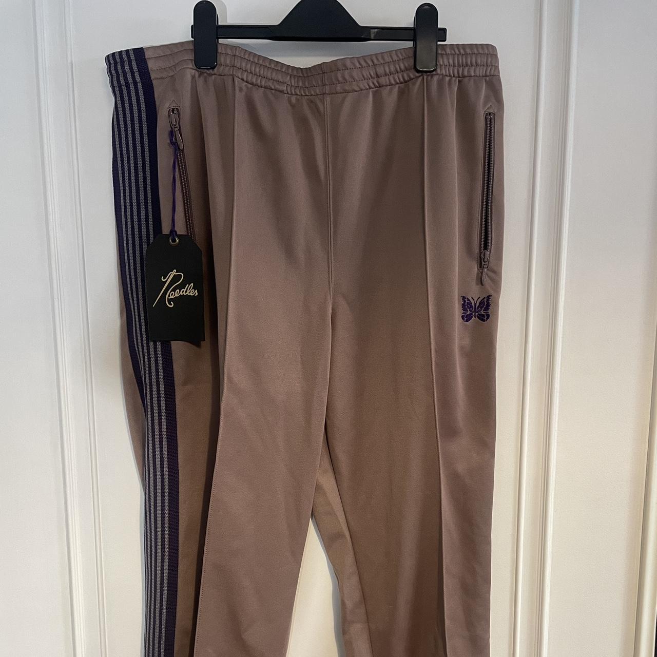Needles 2022 slim fit jogger with zip up details.... Depop