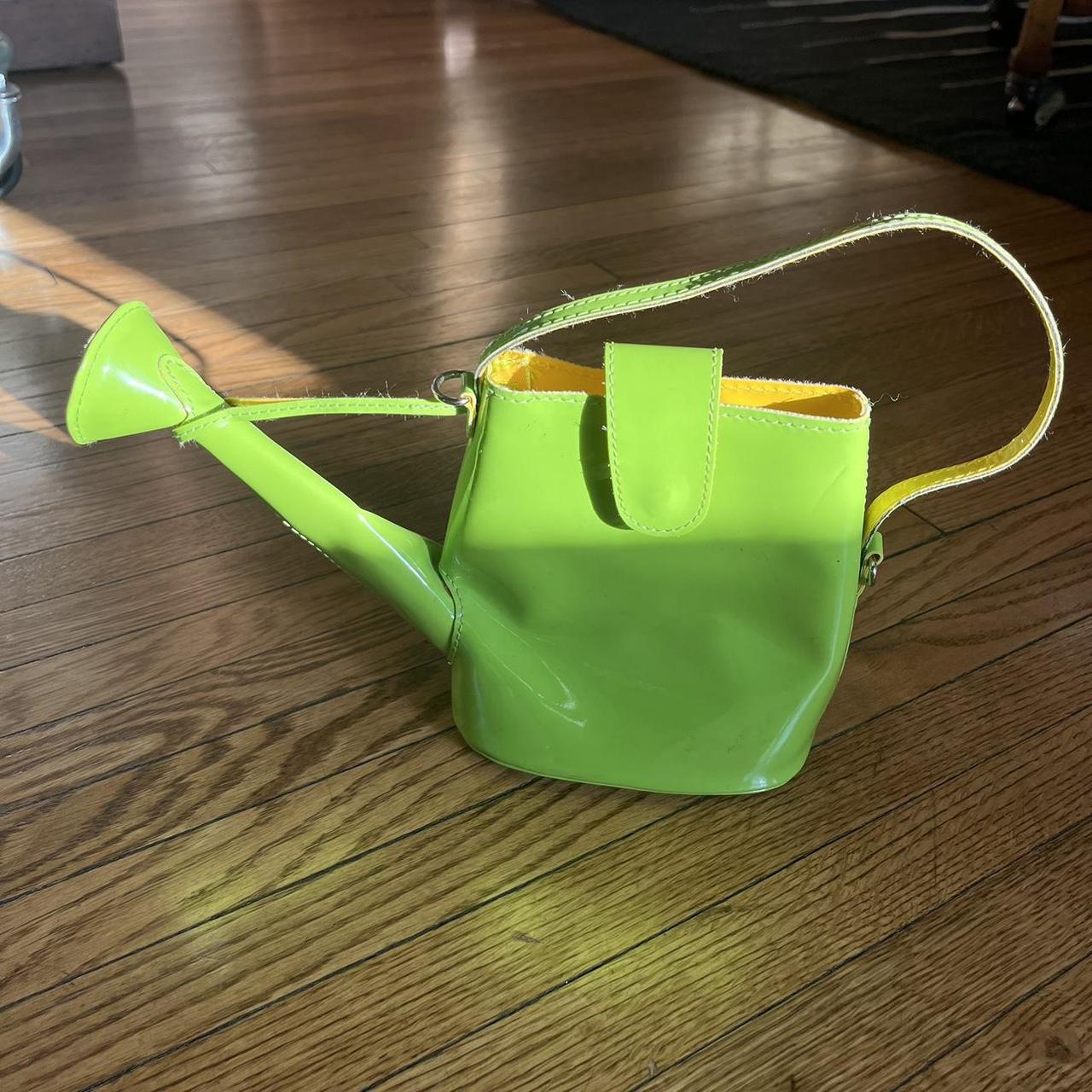Watering can purse. Can’t hold very much but boy is... Depop